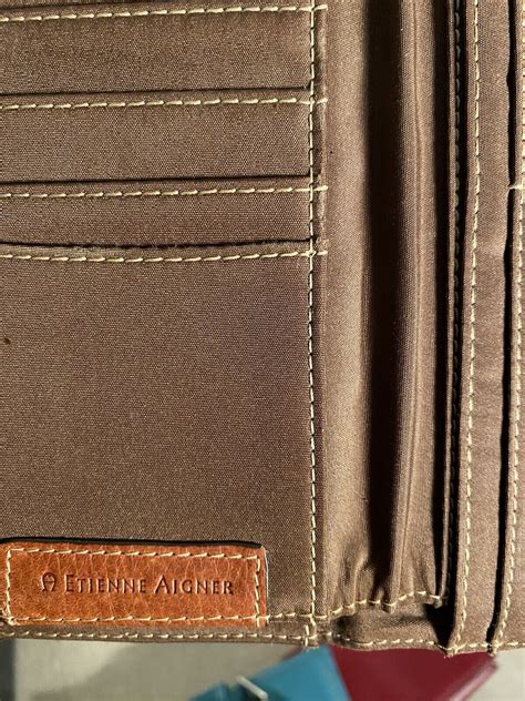 giani Bernini vs aigner wallet